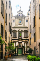 Fototapeta na wymiar Building facade in Palazzo Ricca in the city center in Napoli Italy