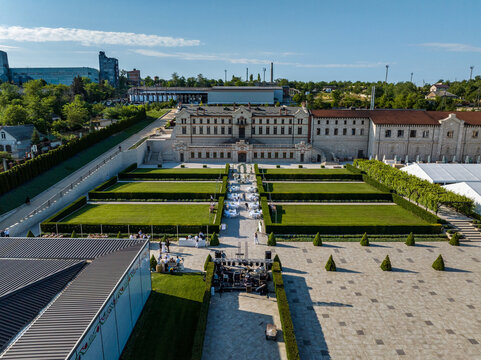 aerial view of the decorating team prepares the venue for the wedding party at mimi luxury castle