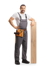 Craftsman posing with a wooden floor beam