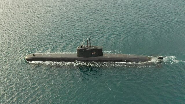 Submarine, transport and sailing at ocean, sea and travel for army, military and navy vessel. Drone of underwater marine boat, ship and steel fleet for battle, armed forces and coastal naval defence