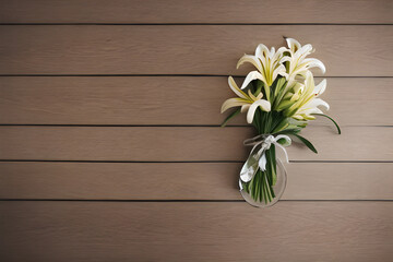 Bouquet of white flowers on wooden background