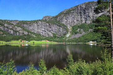 Fototapeta na wymiar Lakeside village in Setesdal, Norway. Beautiful landscape in Agder region.