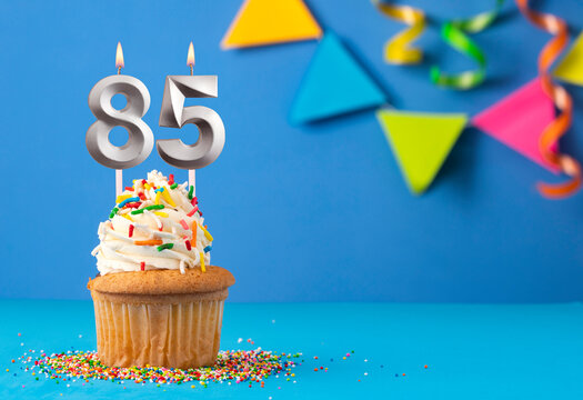Candle number 85 - Cake birthday in blue background