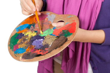 Artist paints a picture of oil paint brush, close-up view