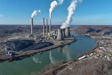 Power Plant with Blue Sky in Bend of Green River