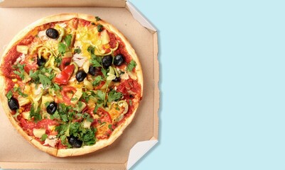 Tasty fresh pizza dish on desk
