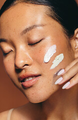 Facial skincare with exfoliating cream - obrazy, fototapety, plakaty