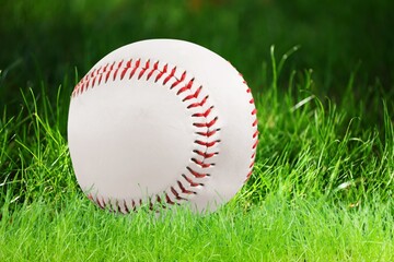 Sports baseball ball on green grass