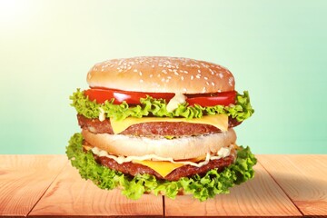 Tasty fresh Hamburger dish on desk