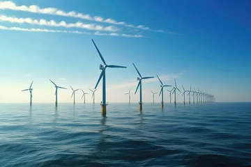 Fotobehang Windmill park standing in the sea on a cloudy day. Wind turbines standing in the sea. © Andreas