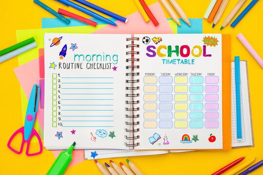 Morning Routine Checklist, School timetable. Top view flat lay concept. Lettering written in a scrapbook, colored paper, multi-coloured letters, supplies for school