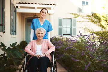 Senior woman, wheelchair and portrait of nurse in healthcare support or garden walk at nursing...