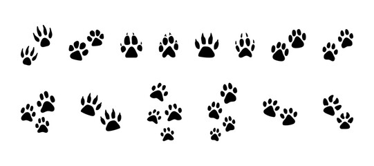 Fototapeta na wymiar Set of black vector paw prints. Animal prints silhouettes, collection of illustrations for pets, animal protection theme, nature reserves, homeless animal shelters, pet stores and veterinary clinics.