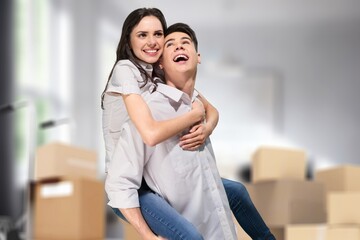 Fototapeta premium Happy excited couple moving in new house together