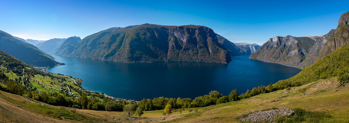 Fototapeta na wymiar Panoramic Shot of Aurlandsfjord and the city of Aurlandsvangen Sogn og Fjordane, Norway.