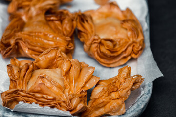 Deliciously Flaky: Step-by-Step Journey of Making Fried Flaky Pastries with Sweet Potato Filling, Fried in Lard, and Glazed with Syrup