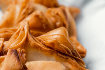 Deliciously Flaky: Step-by-Step Journey of Making Fried Flaky Pastries with Sweet Potato Filling, Fried in Lard, and Glazed with Syrup