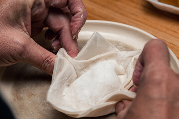Deliciously Flaky: Step-by-Step Journey of Making Fried Flaky Pastries with Sweet Potato Filling, Fried in Lard, and Glazed with Syrup