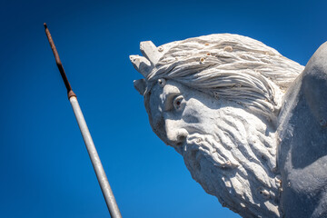 la scultura del Tritone a Porto Azzurro sull'Isola d'Elba