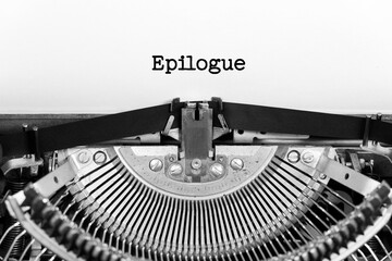 Epilogue word closeup being typing and centered on a sheet of paper on old vintage typewriter mechanical - obrazy, fototapety, plakaty