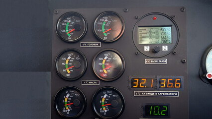 Indicators of aircraft instruments in the cockpit. The instrument panel on board the aircraft.