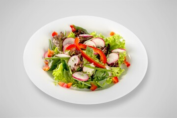 plate of fresh tasty salad with cheese