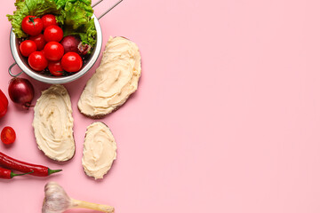 Fototapeta na wymiar Tasty sandwiches with cream cheese on pink background