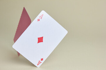 Two Balancing Ace of Diamonds Cards