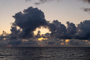 sunset with clouds over the sea