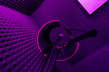 Fototapeta premium professional recording studio song recording equipment microphone close-up bottom view purple neon light