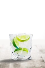 Gin tonic tasty alcoholic cocktail with lime and ice