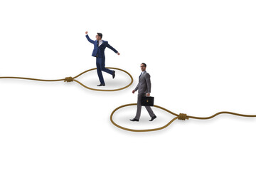 Business people trapped by a rope