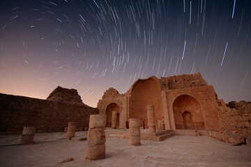 ancient building and stars moving in the background in the ancient city of Shivta - Israel 