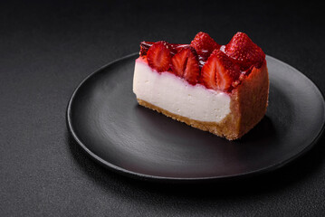 Delicious fresh cheesecake with strawberries, syrup and mascarpone cheese