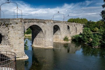 Fototapeta na wymiar Old Bridge (Pont Vieux) Over River Aude At The City Of Carcassone, France