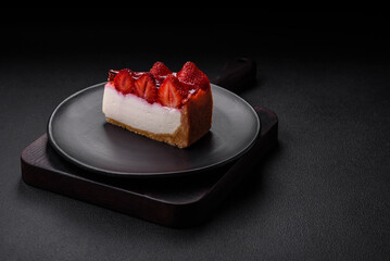 Delicious fresh cheesecake with strawberries, syrup and mascarpone cheese