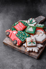 Beautiful colored Christmas gingerbread cookies for the design and decoration