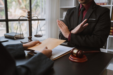 Lawyer or legal adviser, businessman refusing money coming with paper envelope Anti-bribery...