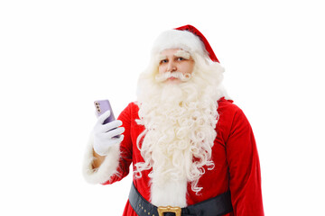 Santa Claus on a white background with a smartphone in his hands. 