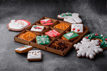 Beautiful colored Christmas gingerbread cookies for the design and decoration