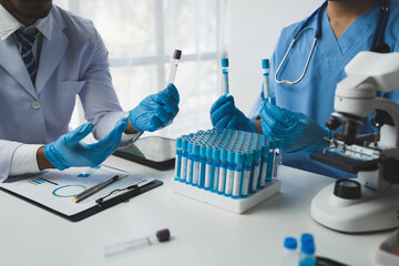 medical research laboratory A team of scientists or doctors use in vitro solutions to analyze data...