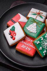 Beautiful colored Christmas gingerbread cookies for the design and decoration
