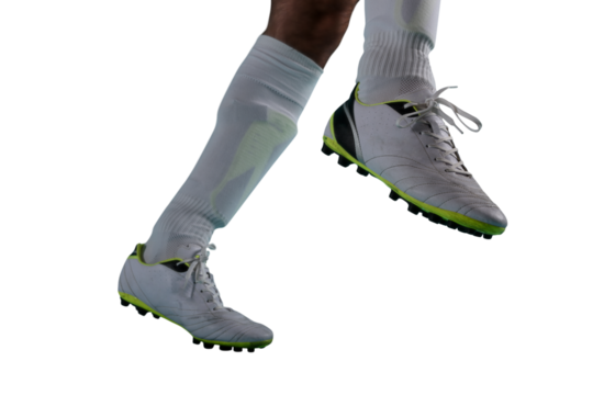 Isolated football  player plays with soccerball in a match