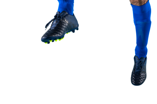 Isolated football  player plays with soccerball in a match