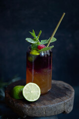 Summer cocktail with fruits and rose