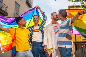 Lifestyle of homosexual friends having fun at gay pride party in the city, diversity of young...