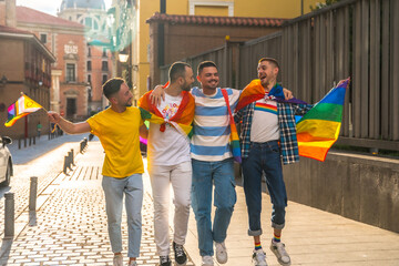 Couples of men smiling at the demonstration with the rainbow flags, gay pride party in the city, lgbt concept