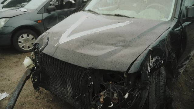 Holes from shrapnel in the body of a civilian car. Ukraine. Bucha 2022.