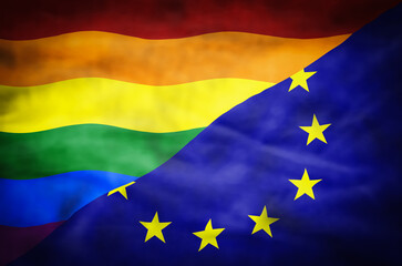 Rainbow LGBT flag and European Union mixed flag. Wavy flag of Rainbow and European Union fills the frame.