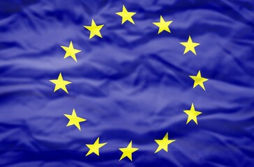 European Union flag on a wavy background. Wavy flag of European Union fills the frame.